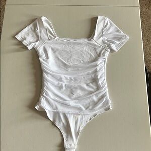 Elegant White Lace-Trimmed Bodysuit